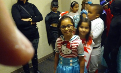 Students walk around the school, showing off their wonderful costumes! At the front we have a Hello Kitty Sailor!