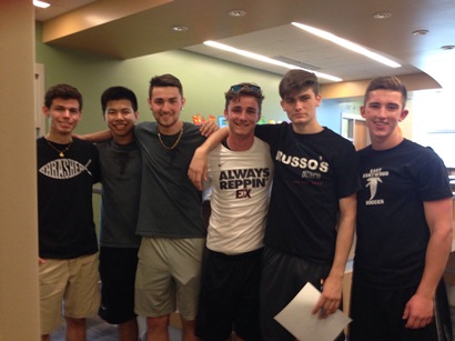 The six varsity soccer players, pose for a picture.